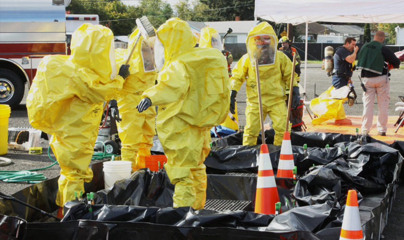 Responders dressed in protective clothing responding to public health emergencies, including bioterrorism events.